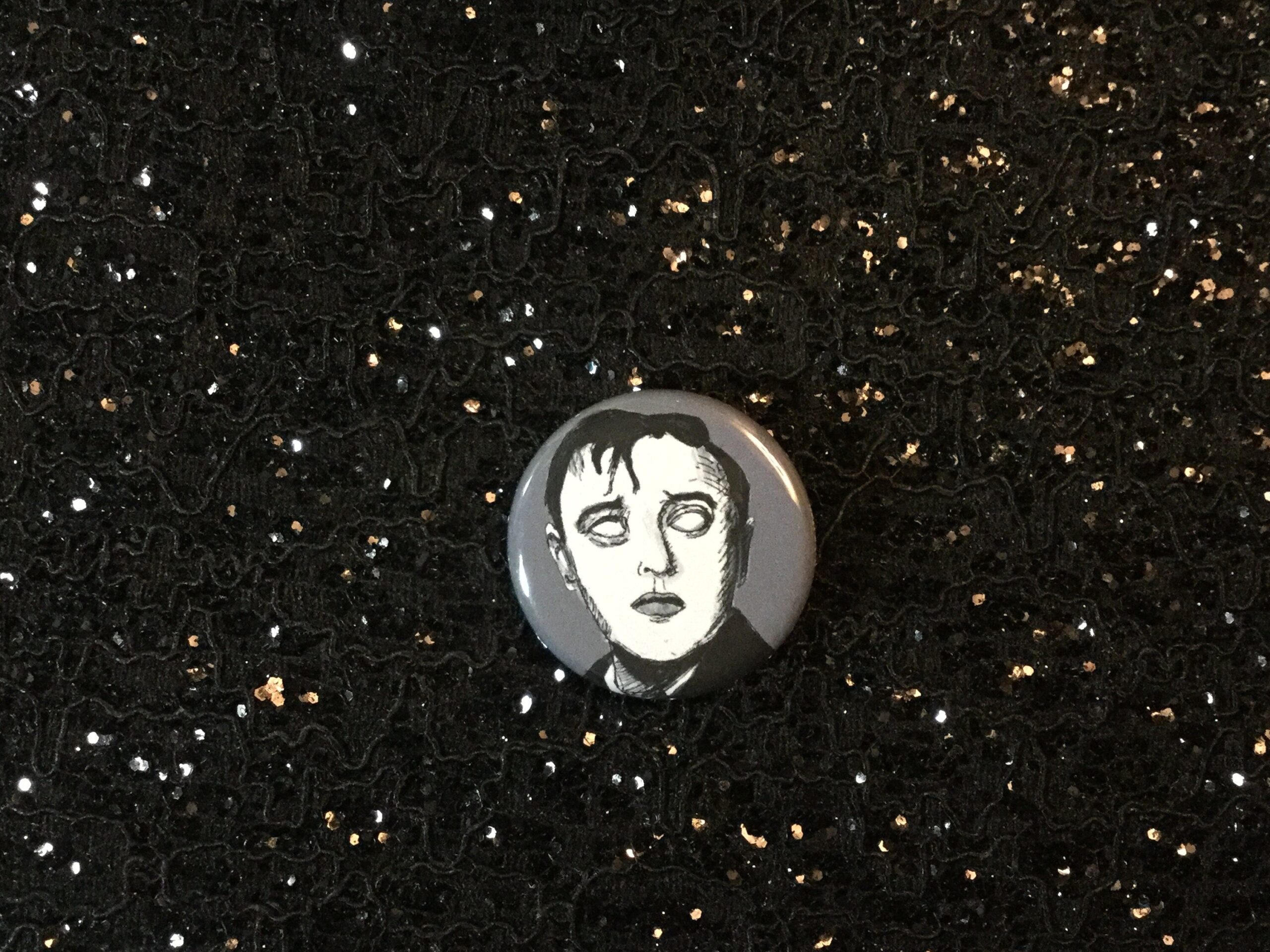 Get spooky with the Peter Lorre Zombie Pinback Button. Perfect for horror fans and zombie enthusiasts. Hand-crafted with love, it's a must-have creepy accessory.