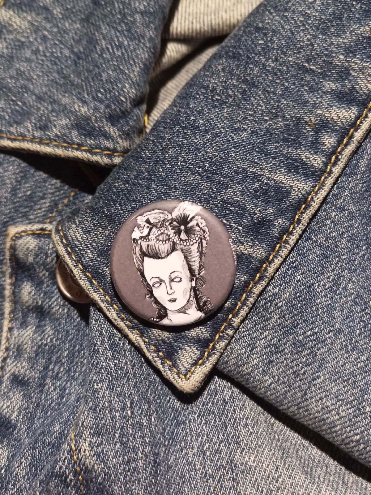 Let them eat brains! This zombie Marie Antoinette pin is perfect for spooky collectors & history lovers. Grab yours and rule the undead runway!